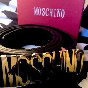 A Moschino black and gold belt